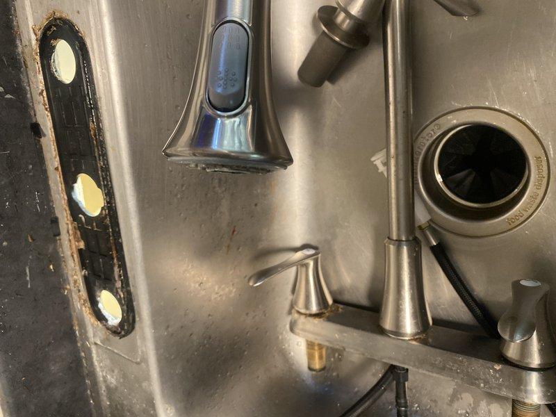 Responded to callback regarding low water pressure at bathroom and kitchen sinks following 50-gallon gas water heater installation. Inspected kitchen sink fixtures, faucet aerators, and supply lines to diagnose pressure loss issue. Verified water heater installation parameters and restored proper water pressure to all affected fixtures throughout the residence.