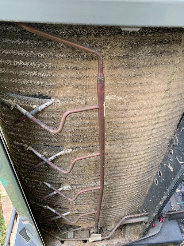 Responded to no heat call and performed comprehensive inspection of 8-year-old Trane furnace system that was reported to shake during operation following recent home inspection findings. Conducted thorough visual and operational assessment of heating unit and associated components.

Inspected evaporator coil assembly and found significant dust and debris accumulation on coil fins, which can restrict airflow and contribute to system vibration and reduced efficiency. Examined copper refrigerant lines throughout the system, noting normal aging and oxidation consistent with unit age. Verified all refrigerant line connections and routing for proper installation and secure mounting.

Evaluated heat exchanger surfaces and found moderate dust buildup on aluminum fins, particularly in upper sections, with some areas showing environmental contamination. Checked unit mounting and cabinet integrity to identify potential sources of vibration during operation. Inspected electrical connections and wi