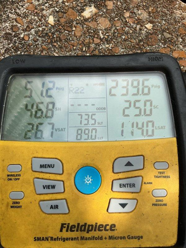 Responded to no cooling complaint on ground-level condensing unit. Upon arrival, found system blowing warm air. Performed diagnostic testing using refrigerant manifold gauges, which revealed abnormal pressure readings of 512 PSIG on low side and 2396 PSIG on high side, indicating refrigerant system issue. Measured superheat at 468°F and subcooling at 250°F, confirming improper system operation. Set thermostat to fan-only mode as instructed to prevent further compressor operation until repairs can be completed.