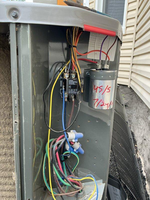 Responded to no-cool call at property being prepared for sale. Upon arrival, inspected outdoor condensing unit and found failed dual-run capacitor preventing compressor and condenser fan operation. Replaced defective capacitor with proper rated replacement, restored power, and verified system startup with normal amperage draws on both compressor and fan motor. Unit cooling properly at time of departure.