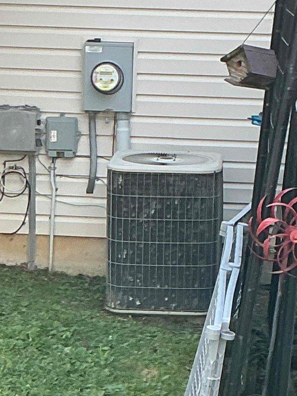 Responded to no cooling complaint on 16-year-old residential air conditioning system. Upon arrival, performed comprehensive diagnostic evaluation of both indoor Lennox furnace/air handler unit and outdoor condensing unit. System had received maintenance service in April but was failing to maintain desired indoor temperatures. Conducted visual inspection of equipment, checked refrigerant pressures, tested electrical components, and verified proper airflow through the system. Evaluated condenser operation, blower motor function, and thermostat communication. Documented equipment condition with photos of basement air handler installation and exterior condensing unit. Identified root cause of cooling deficiency and completed necessary repairs to restore system to proper operating condition. Tested system operation post-repair to confirm adequate cooling capacity and temperature differential across evaporator coil. Unit cycling properly and maintaining setpoint upon departure.