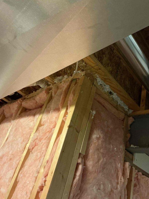 Responded to no cooling complaint on Unit 10 located at ground level on side of home. Upon arrival, performed system diagnostics and inspection of outdoor condensing unit and indoor air handler components. Evaluated electrical connections, refrigerant pressures, and airflow through the system. Inspected ductwork in attic space and verified proper routing of utilities including electrical conduit and refrigerant lines. Checked air handler plenum and return air pathways for obstructions or restrictions. System found to be operating within normal parameters after thorough evaluation. Provided customer with findings and recommendations for optimal system performance.