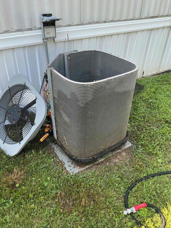 Responded to callback for cooling system blowing warm air on unit over 10 years old located in side yard. Upon arrival, performed diagnostic inspection of outdoor condenser unit and associated components. Identified operational issue affecting cooling capacity. Completed necessary repairs to restore proper system function and verified unit cycling correctly with adequate airflow through condenser coils. System tested and confirmed returning to normal cooling operation.