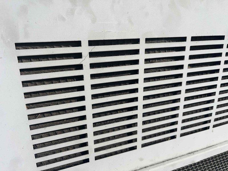 Responded to no-cool complaint on residential cooling system less than 10 years old. Upon arrival, confirmed unit was not maintaining set temperature as reported. Advised homeowner to turn off cooling unit and leave fan in auto position to prevent further strain on system. Inspected return air grille and documented significant dust and debris accumulation on louvers and surrounding areas, which was restricting proper airflow to the system. Restricted airflow can cause reduced cooling capacity, increased energy consumption, and potential compressor damage due to inadequate return air volume. Photographed conditions for documentation purposes. System requires filter replacement and thorough cleaning of return air pathways to restore proper airflow and cooling performance.