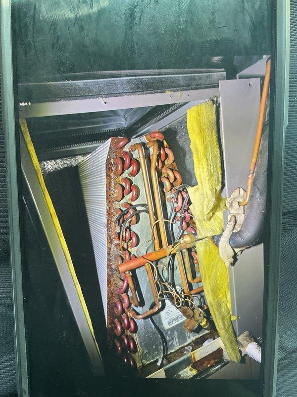 Responded to no cooling complaint on 5-year-old Lennox system with excessive noise. Upon inspection, discovered severely deteriorated refrigerant line insulation and evidence of significant corrosion on copper piping throughout the evaporator coil assembly. Identified compromised suction line insulation allowing heat gain and reducing system efficiency. Replaced degraded foam insulation on refrigerant lines, cleaned oxidized copper connections, and verified proper refrigerant flow. System tested post-repair with normal operating temperatures and noise levels restored. Unit returned to full cooling capacity with whole-home comfort achieved.