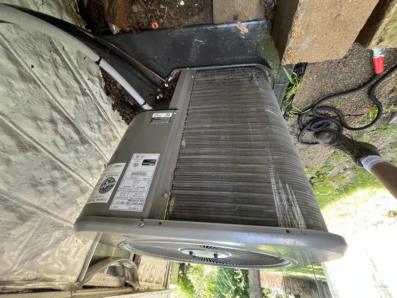Responded to no cooling call on residential system over 10 years old located in side yard. Upon arrival, found outdoor condensing unit not operating and homeowner had been advised to turn system off. Performed diagnostic evaluation of HVAC system including electrical components, contactor, capacitor, and thermostat communication. Inspected indoor air handler and noted multiple air filters stored in basement area. Tested system operation and identified failure point preventing unit from engaging. Completed necessary repairs to restore cooling function and verified proper system startup and operation before departure.