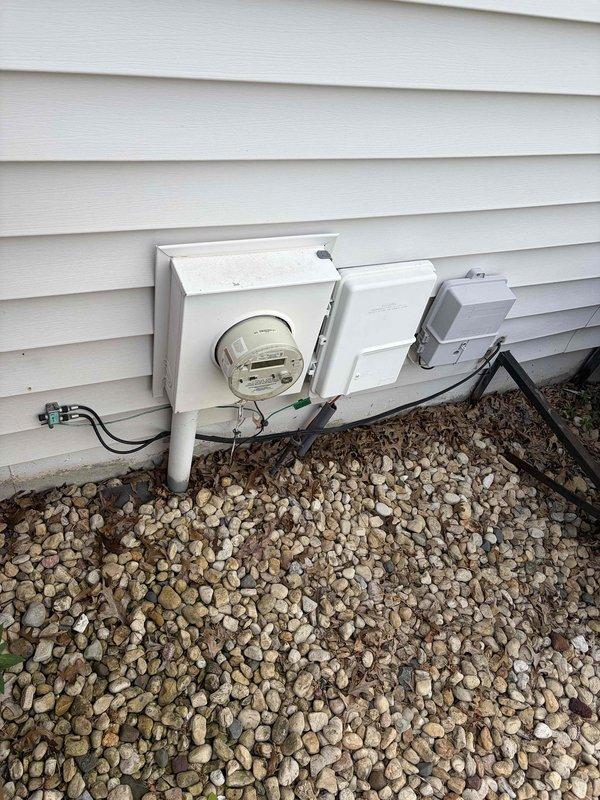 Responded to service call for two non-functional outdoor outlets following rain storm. Upon inspection, traced circuit to exterior electrical service panel and identified moisture intrusion causing GFCI protection to trip. Reset breaker, tested both outdoor receptacles for proper operation, and verified ground fault protection functioning correctly. All outlets restored to full working condition.