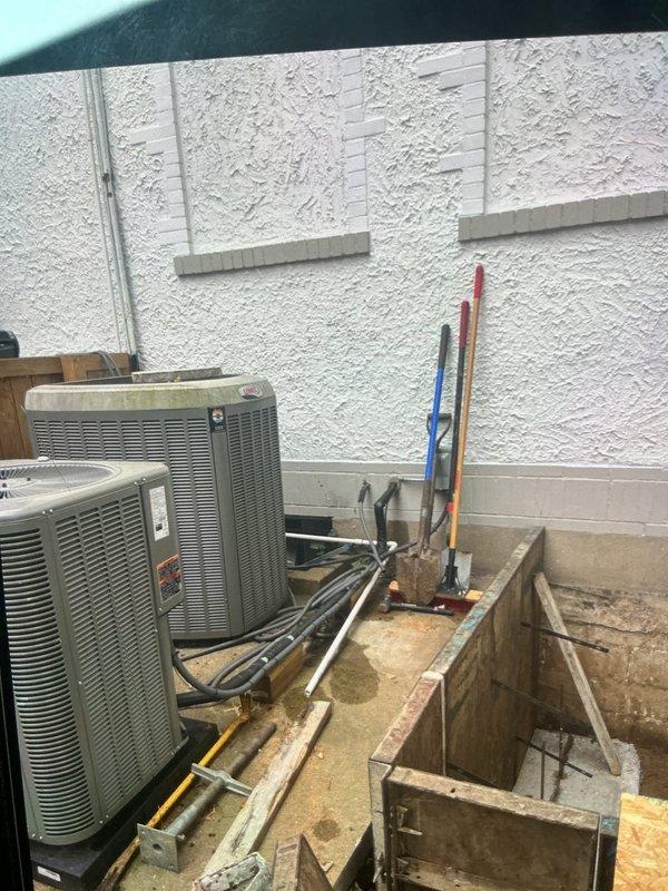 Responded to callback for attic-mounted A/C unit U10 that had intermittently stopped working after initial service visit. Upon arrival, inspected outdoor condenser units and verified electrical connections, refrigerant lines, and operational components. System was found cycling properly during diagnostic testing, with both condenser units functioning as designed and no immediate faults detected at time of inspection.