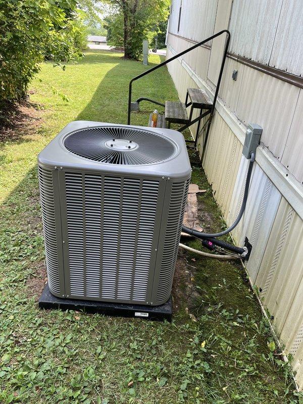Completed warranty replacement of outdoor condensing unit, serial number 1926C38115. Installed new condenser, connected refrigerant lines and electrical service, verified proper system operation using digital manifold gauges, and confirmed appropriate pressures and temperatures. Unit mounted on pad with all penetrations properly sealed; defective unit retained per warranty requirements.