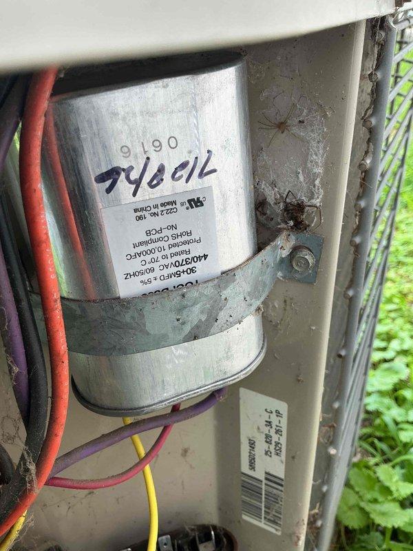 Responded to service call for capacitor replacement on outdoor air conditioning unit as recommended during previous maintenance visit. Upon arrival, accessed electrical compartment and confirmed dual-run capacitor rated at 440/370VAC showed signs of age and deterioration. Performed electrical diagnostics using digital clamp meter to verify system performance and voltage readings at contactor and capacitor terminals. Safely discharged and removed failed capacitor, disconnected all wire leads, and installed new dual-run capacitor with proper voltage rating. Reconnected all electrical connections to appropriate terminals ensuring secure wire placement. Verified proper operation of compressor and condenser fan motor, confirmed amperage draws within manufacturer specifications, and tested contactor engagement. System cycled normally with no abnormal sounds or performance issues detected. Secured electrical panel and restored unit to full operational status.