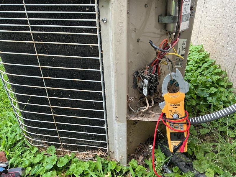 Responded to service call for capacitor replacement on outdoor air conditioning unit as recommended during previous maintenance visit. Upon arrival, accessed electrical compartment and confirmed dual-run capacitor rated at 440/370VAC showed signs of age and deterioration. Performed electrical diagnostics using digital clamp meter to verify system performance and voltage readings at contactor and capacitor terminals. Safely discharged and removed failed capacitor, disconnected all wire leads, and installed new dual-run capacitor with proper voltage rating. Reconnected all electrical connections to appropriate terminals ensuring secure wire placement. Verified proper operation of compressor and condenser fan motor, confirmed amperage draws within manufacturer specifications, and tested contactor engagement. System cycled normally with no abnormal sounds or performance issues detected. Secured electrical panel and restored unit to full operational status.