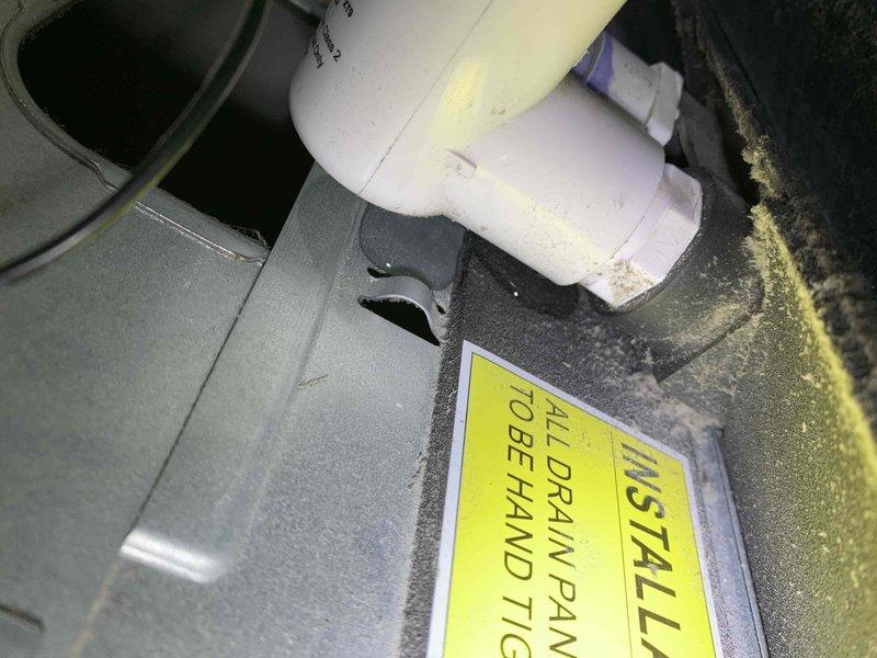 Responded to no cooling call on 2021 Carrier system that stopped operating at 8:45 PM previous evening. Upon arrival, inspected air handler and condensing unit for power and operational issues. Verified electrical connections, checked circuit breakers, and tested capacitor and contactor functionality. System restored to normal cooling operation. Documented equipment installation with photos showing air handler location and surrounding mechanical components in utility space.