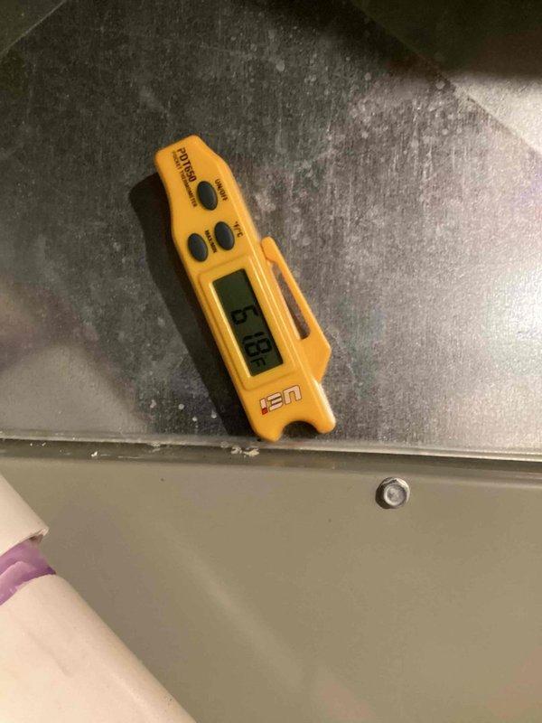 Responded to callback for 6-year-old system not maintaining desired temperature during extreme heat conditions (97°F ambient). Performed comprehensive diagnostic evaluation using refrigerant manifold and micron gauge to verify system pressures, temperatures, and overall performance following recent service work. Measured supply air temperatures and confirmed unit is operating within manufacturer specifications with proper refrigerant charge and airflow.