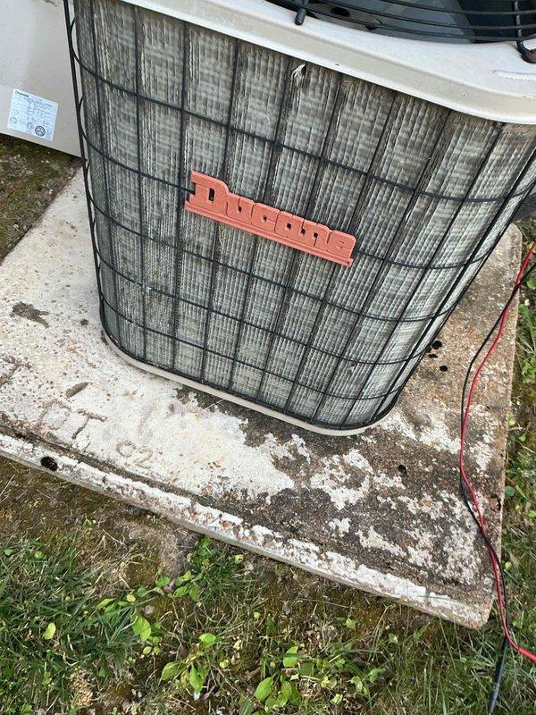 Responded to no cooling complaint on 10+ year old Ducane air conditioning system. Upon arrival, found outdoor condenser unit with heavily soiled condenser coil restricting airflow. Performed diagnostic evaluation of system components including compressor operation, refrigerant pressures, and electrical connections. Cleaned condenser coil to restore proper airflow through unit. Verified indoor General Electric furnace blower operation and airflow distribution through ductwork. System restored to normal cooling operation with proper temperature differential across evaporator coil and adequate airflow throughout home.