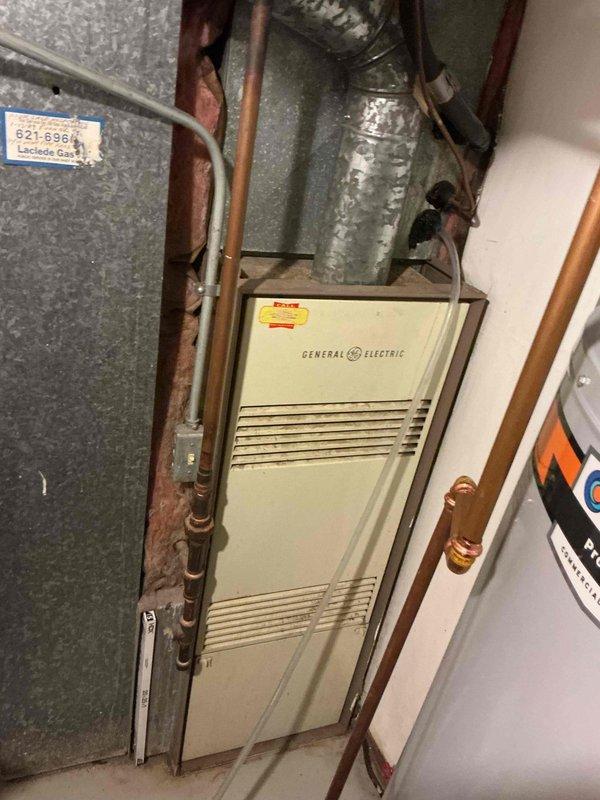 Responded to no cooling complaint on 10+ year old Ducane air conditioning system. Upon arrival, found outdoor condenser unit with heavily soiled condenser coil restricting airflow. Performed diagnostic evaluation of system components including compressor operation, refrigerant pressures, and electrical connections. Cleaned condenser coil to restore proper airflow through unit. Verified indoor General Electric furnace blower operation and airflow distribution through ductwork. System restored to normal cooling operation with proper temperature differential across evaporator coil and adequate airflow throughout home.