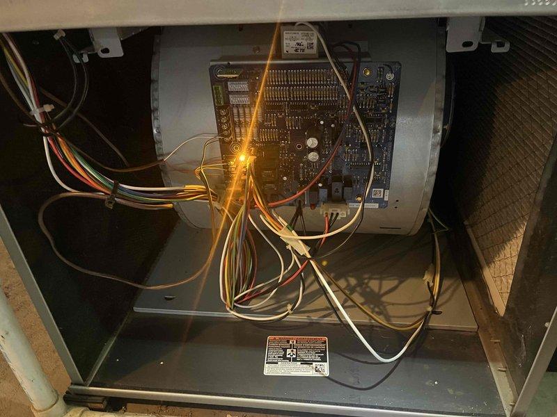 Performed complete cooling system tune-up on ground-level backyard unit U10. Inspected and photographed 16x25x1 air filter showing moderate dust accumulation with discoloration in lower section. Accessed control panel to inspect electrical components, circuit board, capacitors, wiring connections, and transformer; all components found in proper working condition with secure connections throughout the system.