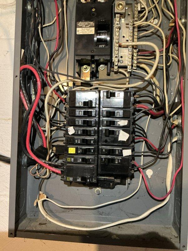 Responded to no-power condition in garage area on return service call. Inspected main electrical panel and identified tripped breaker supplying garage circuit. Reset breaker, verified proper operation, and restored full power to garage area.