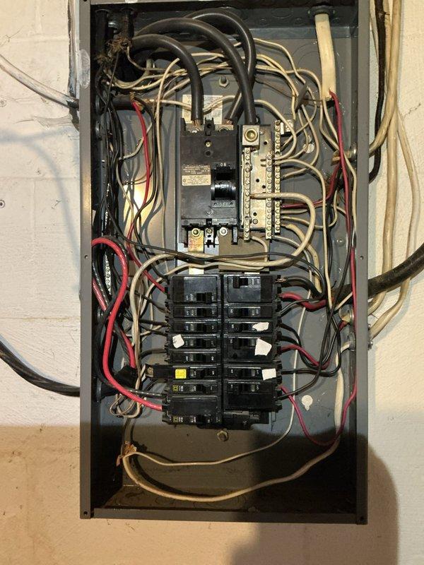 Responded to no-power condition in garage area on return service call. Inspected main electrical panel and identified tripped breaker supplying garage circuit. Reset breaker, verified proper operation, and restored full power to garage area.