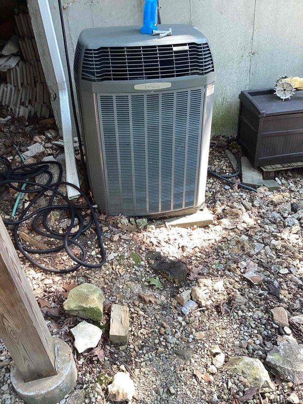 Responded to no cooling complaint on 10+ year old system located in basement. Upon inspection, advised customer to shut off AC unit and leave fan running to prevent further system damage. Evaluated outdoor condenser unit and indoor thermostat settings, which was set to 80 degrees in hold mode. Documented equipment condition and provided immediate operational guidance to protect system integrity until further diagnostics or repairs could be completed.