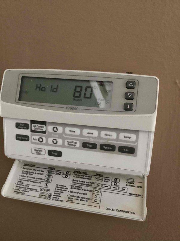 Responded to no cooling complaint on 10+ year old system located in basement. Upon inspection, advised customer to shut off AC unit and leave fan running to prevent further system damage. Evaluated outdoor condenser unit and indoor thermostat settings, which was set to 80 degrees in hold mode. Documented equipment condition and provided immediate operational guidance to protect system integrity until further diagnostics or repairs could be completed.