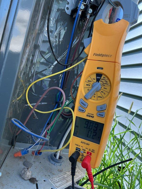 Completed preventative maintenance tune-up on a 4-year-old ground-level AC unit. Performed system diagnostics using digital multimeter to verify electrical components and connections, inspected internal wiring and terminals, and documented a heavily soiled 20x31 air filter requiring replacement due to significant dust and debris accumulation. All electrical readings were within normal operating parameters and unit is functioning properly.