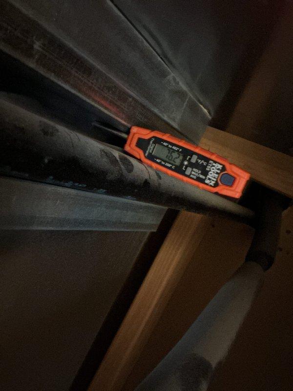 Responded to recall for 10-year-old AC unit not cooling with indoor temperature at 78 degrees. Upon arrival, unit was shut off. Performed diagnostic testing using digital multimeter at supply register and measured airflow temperatures at ductwork in attic space. Inspected HVAC system components, took temperature and system performance readings at multiple points including ceiling diffuser and main trunk line. Completed diagnostic assessment and documentation of system conditions. Unit evaluated and measurements recorded for proper cooling performance verification.