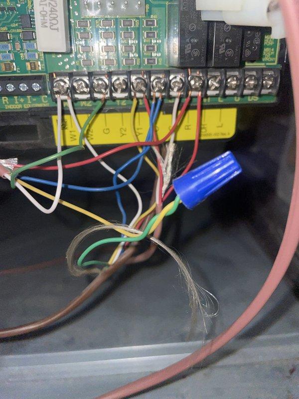 Responded to no cooling complaint following power restoration. Upon inspection, found control board wiring connections compromised. Inspected circuit board terminals and wire connections at terminal strip, verified proper wire routing and secure connections to control board. Tested system operation, restored cooling functionality, and confirmed all electrical connections were properly seated and secure.
