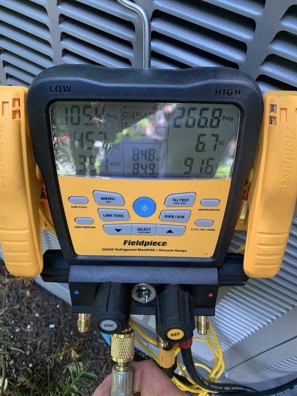 Replaced Unico evaporator coil in attic unit. System tested and verified operational with proper refrigerant pressures and temperatures recorded on manifold gauges. Thermostat confirmed functioning correctly in cooling mode.