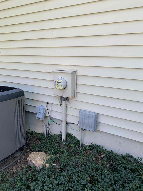 Conducted site evaluation for whole home generator installation at residential property. Assessed existing electrical service entrance, including main meter enclosure, conduit routing, and available clearances adjacent to HVAC equipment. Documented current utility configuration, ground cover conditions, and exterior wall mounting locations to determine optimal generator placement and transfer switch integration requirements for comprehensive backup power system estimate.