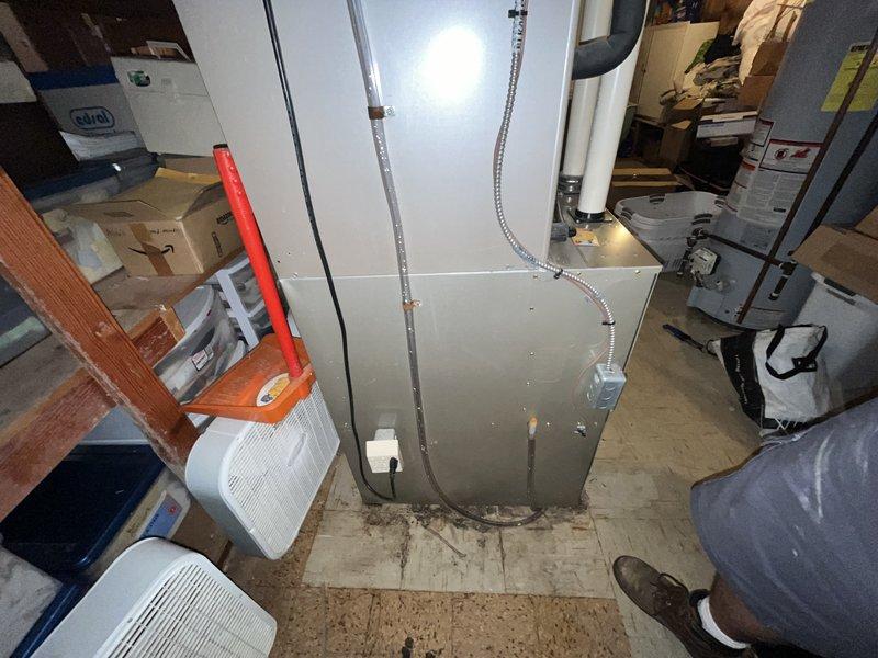 Installed new condensate drain line for Bryant HVAC system. Ran new drainage piping to properly route condensate away from the furnace unit, resolving drainage issues. System tested and verified operational upon completion.