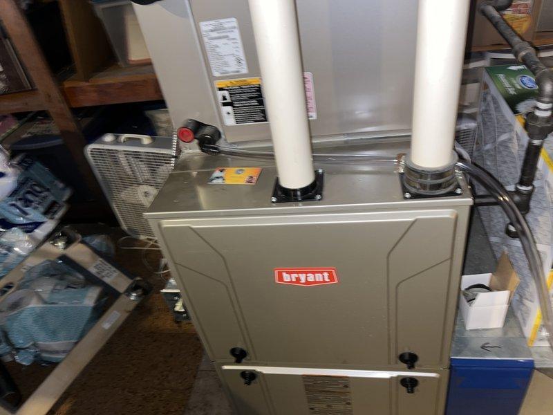 Installed new condensate drain line for Bryant HVAC system. Ran new drainage piping to properly route condensate away from the furnace unit, resolving drainage issues. System tested and verified operational upon completion.