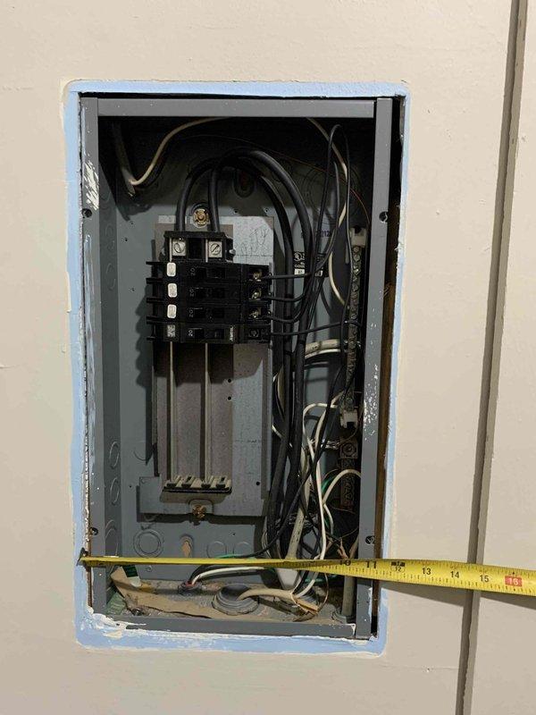 Completed electrical estimate for multiple sub-panel installations at commercial facility. Assessed existing electrical infrastructure, including flush-mount residential-grade panel with multiple circuit breakers and Sylvania-branded panel with limited breaker occupancy. Documented panel configurations, measured dimensions, evaluated available capacity, and photographed current conditions to provide accurate material and labor requirements for proposed sub-panel additions.