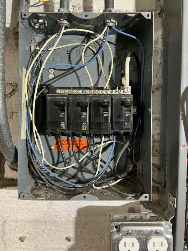 Responded to service call for new breaker installation required for HVAC unit. Installed appropriately-rated circuit breaker in existing Square D electrical panel to provide dedicated circuit for heating and cooling equipment. Verified proper wire sizing, made secure connections to bus bar and load wiring, and confirmed breaker operation. Panel contained mix of single-pole and double-pole breakers with various amperage ratings; new breaker installed in available slot following manufacturer specifications and NEC requirements. All connections torqued to specification and panel secured upon completion.