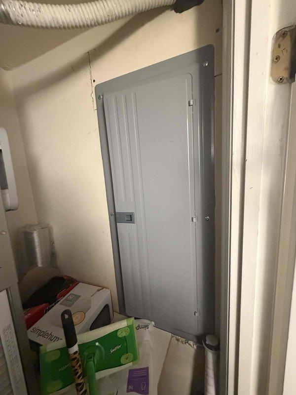 Responded to electrical concerns at kitchen sink area. Inspected garbage disposal switch and GFCI outlet located under sink for reported malfunctions. Evaluated double-gang switch plate controlling disposal unit and assessed GFCI receptacle protection for under-sink area. Documented existing electrical conditions at service panel and kitchen workspace with photos for service records.