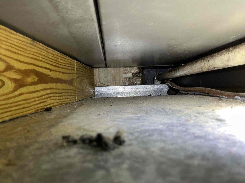 Completed callback to address ongoing condensate drainage issue where unit was rapidly filling with water. Removed existing trap configuration and repiped condensate drain system, installing inline float safety switch to match original setup and prevent water backup. Verified proper drainage flow and tested float switch operation to ensure system protection.