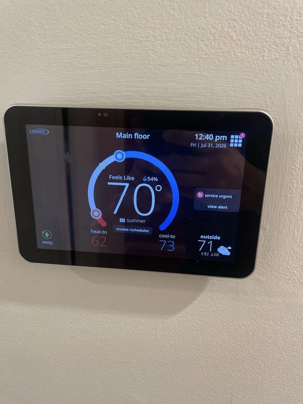 Responded to service call for 8-year-old Lennox system displaying "GF HSI SENSED OPEN" fault code on hallway thermostat. Accessed furnace control board and inspected hot surface igniter circuit and associated wiring connections. Diagnosed faulty sensor connection, performed necessary repairs to ECM drive control board terminals, and cleared fault code. Verified system operation and confirmed thermostat returned to normal heating and cooling functionality with proper communication to control board.