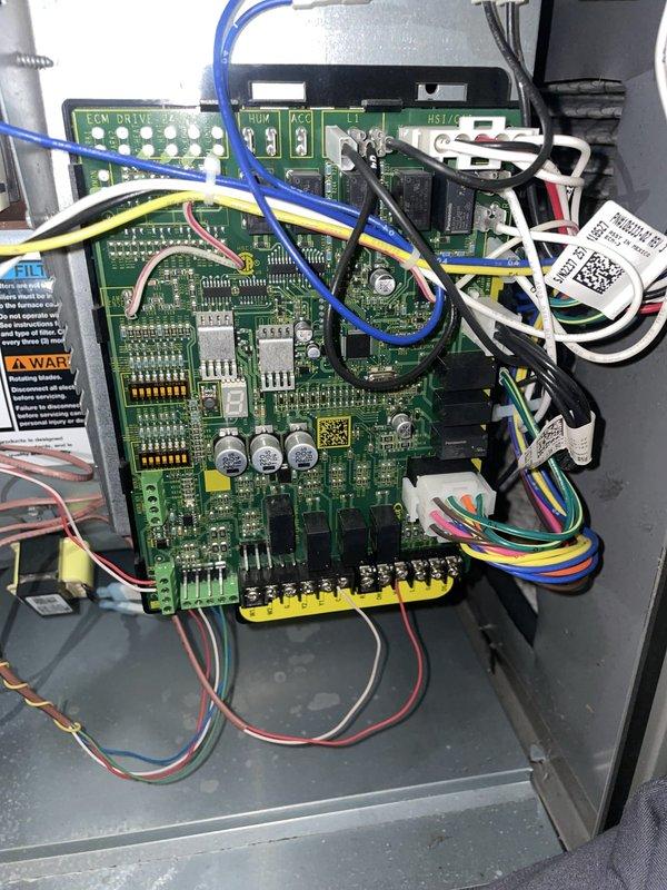 Responded to service call for 8-year-old Lennox system displaying "GF HSI SENSED OPEN" fault code on hallway thermostat. Accessed furnace control board and inspected hot surface igniter circuit and associated wiring connections. Diagnosed faulty sensor connection, performed necessary repairs to ECM drive control board terminals, and cleared fault code. Verified system operation and confirmed thermostat returned to normal heating and cooling functionality with proper communication to control board.