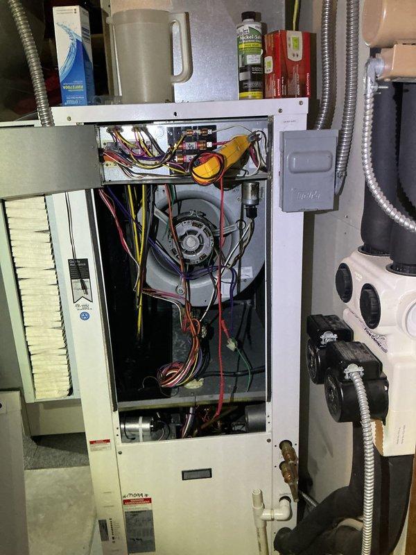 Completed comprehensive inspection of 20+ year old geothermal heating and cooling system including GeoLINK Flow Center with dual circulation pumps and air handler unit. Performed visual inspection of all major components, verified electrical connections at control board and blower motor assembly, and assessed ground loop manifold and pump operation. System found to be functioning within normal parameters with all components operational at time of inspection.