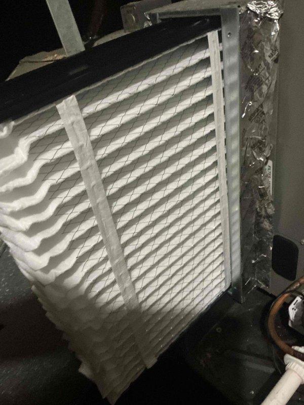 Returned to property to complete filter installation as scheduled. Installed two 20x20x4 filters and four 2-inch filters per specifications. Parts were picked up from Johnstone Earth City location. During service, observed evaporator coil with significant frost and ice buildup, indicating potential airflow restriction or refrigerant issue that may require future attention. All replacement filters were properly installed and old filters were disposed of. System confirmed operational for both heating and cooling modes upon completion.