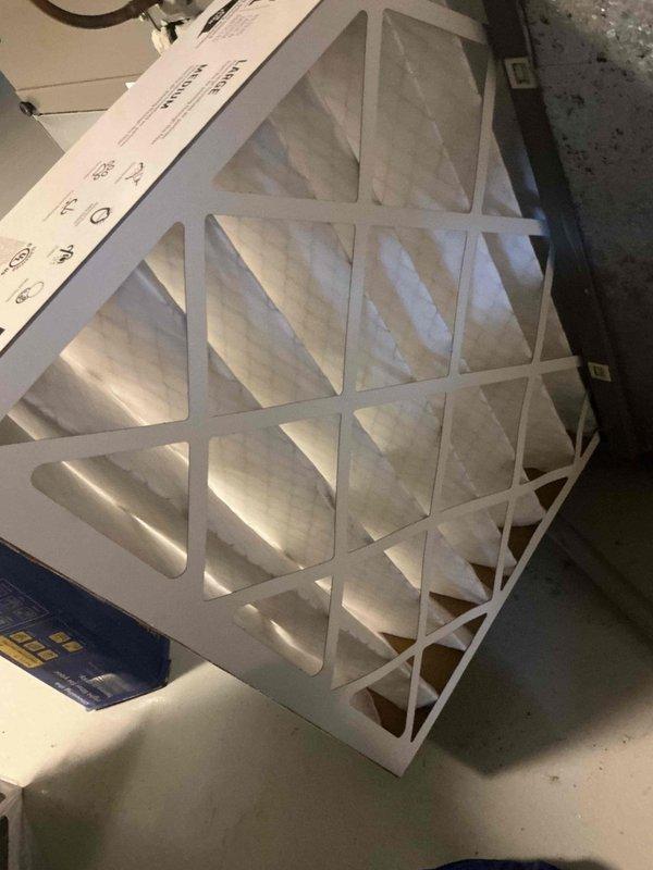 Returned to property to complete filter installation as scheduled. Installed two 20x20x4 filters and four 2-inch filters per specifications. Parts were picked up from Johnstone Earth City location. During service, observed evaporator coil with significant frost and ice buildup, indicating potential airflow restriction or refrigerant issue that may require future attention. All replacement filters were properly installed and old filters were disposed of. System confirmed operational for both heating and cooling modes upon completion.