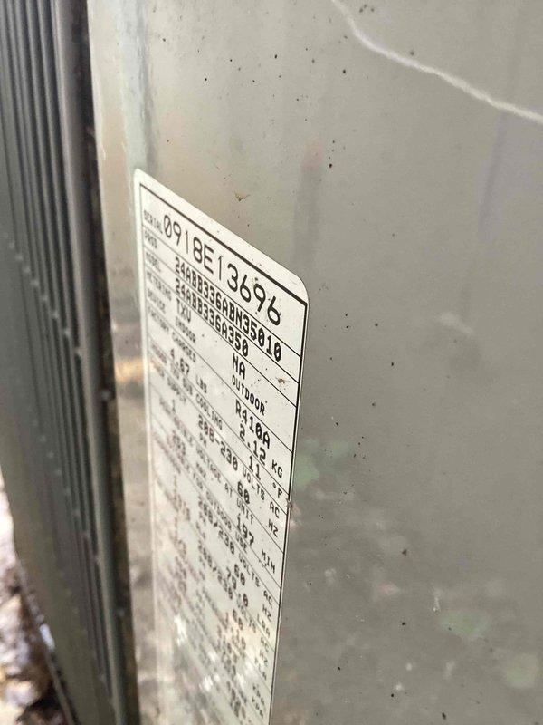 Responded to no cooling complaint with indoor temperature at 83 degrees. Upon arrival, inspected Carrier condensing unit located on side of home, confirmed unit over 10 years old based on equipment data plate. Performed diagnostic evaluation of system components, documented equipment model and serial number information, and captured photographic evidence of outdoor unit condition and manufacturer specifications for service records.