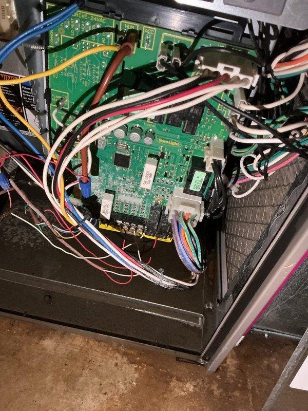 Responded to no-cool call on 2016 Lennox system with reported furnace shutdown and flooded condensate basin. Upon arrival, found significant water accumulation on floor near HVAC unit due to condensate drain line blockage or pan overflow. Accessed main control board and verified system status following customer's Lennox alert notification regarding furnace shutdown. Cleared condensate blockage, tested drain line flow, and restored proper drainage function. Inspected control board wiring and connections for any water damage or corrosion. Cycled system through operational tests to confirm proper startup sequence and verified all safety controls functioning correctly. Unit restored to normal cooling operation with no further shutdown alerts.