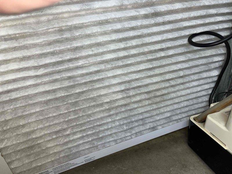 Completed comprehensive cooling maintenance tune-up on 15-year-old air conditioning system. Performed standard inspection of control board, electrical connections, and blower assembly; all components found operating within normal parameters. Inspected air filter showing moderate dust accumulation and addressed customer concern regarding noisy return vent; system confirmed working properly upon completion.