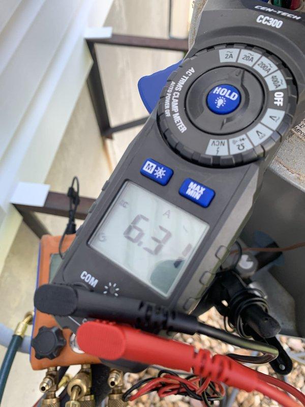 Completed comprehensive tune-up and maintenance on two residential air conditioning systems in a two-level home: one 9-year-old unit and one 15-year-old unit, both outdoor condensers. Performed full diagnostic testing on both systems including amperage draw measurements, voltage readings, temperature differentials, and refrigerant pressure analysis using digital multimeter and manifold gauges. Both units were operating within normal parameters with no issues identified; standard preventive maintenance procedures completed to ensure optimal performance and efficiency for the cooling season.