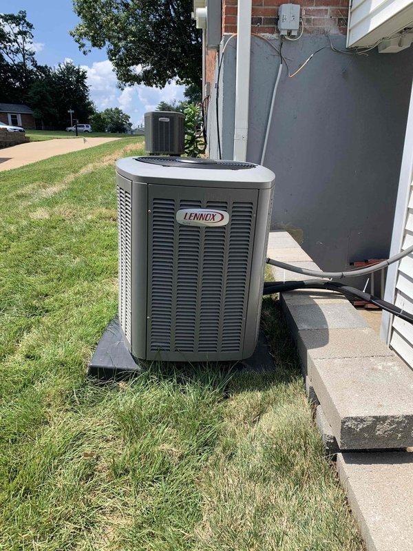 Performed site evaluation of Lennox air conditioning condenser unit located on side of home to assess leveling requirements. Unit currently sits on concrete pad with visible settling concerns. Conducted thorough inspection of outdoor condensate unit positioning, verified proper clearances from structure, and examined refrigerant line connections and electrical conduit routing. Documented current installation condition with photographs and provided estimate for re-leveling service to ensure proper unit operation and drainage.