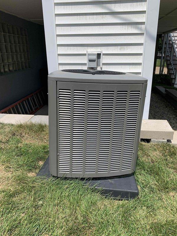 Performed site evaluation of Lennox air conditioning condenser unit located on side of home to assess leveling requirements. Unit currently sits on concrete pad with visible settling concerns. Conducted thorough inspection of outdoor condensate unit positioning, verified proper clearances from structure, and examined refrigerant line connections and electrical conduit routing. Documented current installation condition with photographs and provided estimate for re-leveling service to ensure proper unit operation and drainage.