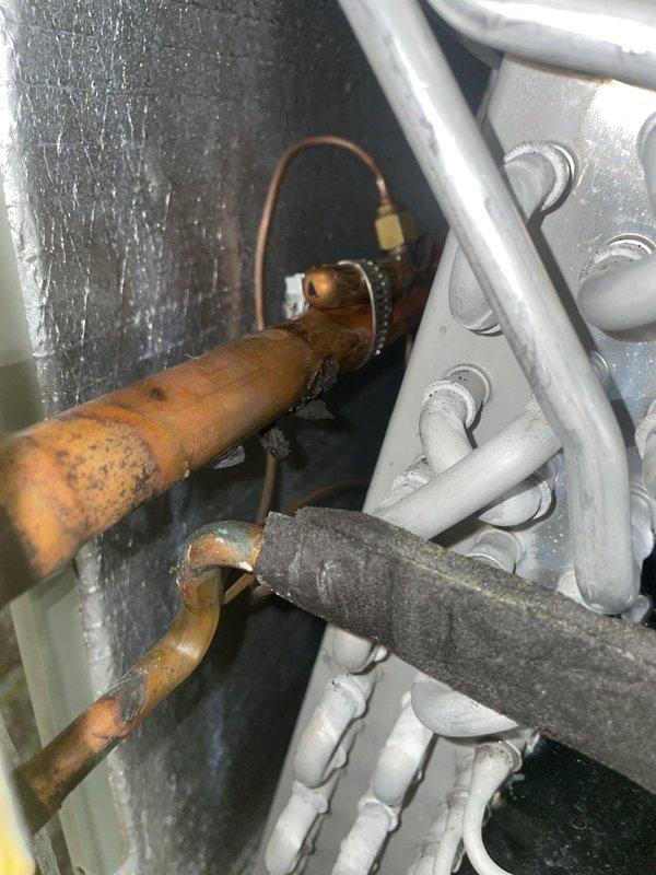 Replaced defective thermal expansion valve (TXV) on evaporator coil serial number 164024de5g. Removed corroded TXV assembly, installed new valve, and properly brazed all connections. Evacuated system, charged with refrigerant to manufacturer specifications, and verified proper operation using manifold gauges to confirm correct superheat and subcooling readings.