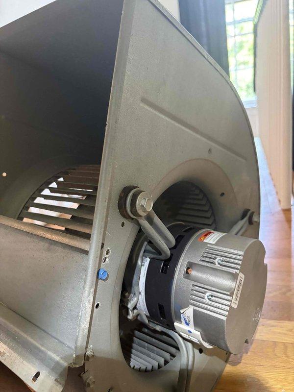Replaced failed blower motor in attic-mounted air handler unit serving second floor. Removed old motor assembly from squirrel cage blower housing and installed new replacement motor. Upon completion, tested system operation and verified proper airflow and performance using digital manifold gauges to confirm temperature and pressure readings were within manufacturer specifications.