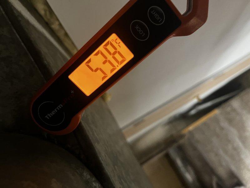 Responded to callback for inadequate cooling and persistent high humidity despite customer-installed dehumidifiers. Performed diagnostic testing on 10-year-old AC system that was running but unable to maintain temperature below 80 degrees with humidity at 87 percent. Measured supply air temperatures at register and evaporator coil to assess system performance. Findings indicate potential evaporator coil restriction or failure affecting both sensible and latent cooling capacity. Recommended evaluation of A-coil condition and possible replacement to restore proper dehumidification and cooling performance.