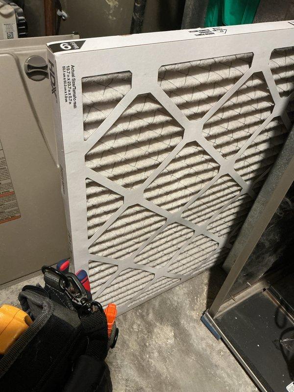 Completed cooling tune-up on single HVAC unit located in side yard. Performed comprehensive system inspection including checking refrigerant levels, electrical connections, and airflow. Inspected air filter which showed moderate dust accumulation, examined unit labels and specifications confirming model UPF36I7ALACAAA in good operating condition for equipment under 10 years old, and documented system components with photos for service records.